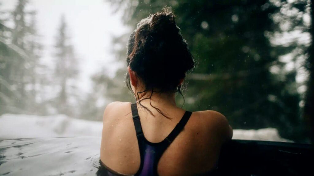 Cold Plunge vs. Hot Bath: Which Is Better for Recovery, Healthy Living + Travel